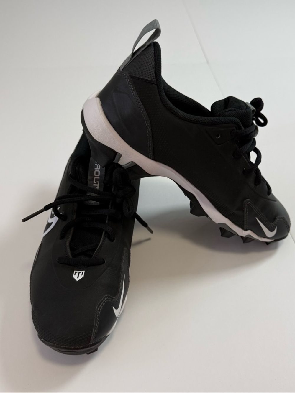 Nike Black and White Low-Top Athletic Cleats